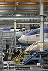 Engineers repair bullet trains at a depot in Goyang, Gyeonggi, on Tuesday, five days ahead of the Lunar New Year, one of the country's two biggest traditional holidays, during which a huge number of people to travel to their hometowns. [YONHAP]