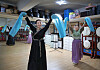 From left, Song Mhin-suk, a licensed dancer of Korean intangible cultural property No. 1 Jongmyo Jeryeak, and Jeon Hee-ja, also a licensed dancer of Korean intangible cultural property No. 97 Salpuri, dance at Jeon's studio in eastern Seoul on July 12. Both are freelance dancers. [PARK SANG-MOON]