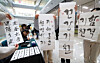 Calligraphers write family mottos and ipchunbang scrolls with phrases such as “Great fortune with the arrival of spring” and “Good health and abundant blessings,” for residents at a free calligraphy event at the Busan Nam-gu Office on Jan. 29, six days before ipchun, the symbolic beginning of spring. Ipchunbang scrolls are pasted on front doors for good luck at the start of spring. [NEWS1]