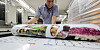 An employee checks next year’s calendar at a printing press in Jung District in Seoul on Tuesday. Korea has a busy year in 2022 starting with the presidential election on March 9 and local elections to be held on June 1. While traditional calendars have seen a sharp drop in sales due to smartphones, they still remain popular for nostalgic and sentimental reasons. [YONHAP]