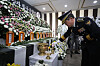 Commissioner General Yoon Hee-keun of the National Police Agency on Friday pays respect to victims of the flooding of an underpass in North Chungcheong at their joint memorial altar set up at the North Chungcheong provincial government building in Cheongju. [YONHAP]