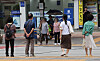 Pedestrians cross a crosswalk in Changwon, South Gyeongsang, on July 17. [JOONGANG ILBO]