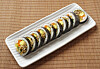 Gimbap in Korea come in various combinations of fillings wrapped in a layer of rice and gim, or dried seaweed. [SHUTTERSTOCK]