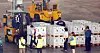 Workers unload boxes carrying 1.6 million doses of Pfizer's Covid-19 vaccine, which the government has secured under a direct contract with the pharmaceutical giant, from a chartered plane at Incheon International Airport on Wednesday. [NEWS1]