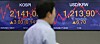 An employee stands in front of a screen with the closing Kospi at the dealing room in Hana Bank located in Jung-district, central Seoul, Wednesday. [YONHAP]