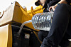 A driver pours urea solution into his vehicle at a gas station in Seoul on Sunday. [YONHAP]