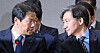 Im Jong-seok, presidential chief of staff of the former Moon Jae-in government, left, and Cho Kuk, then-presidential secretary for civil affairs, talk to each other during a National Assembly meeting in Yeouido, western Seoul, on Dec. 31, 2018. [NEWS1]