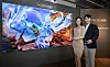 Models introduce Samsung Electronics 110-inch micro LED television at its retail store in Gangnam District, southern Seoul. [SAMSUNG ELECTRONICS]