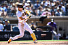San Diego Padres shortstop Kim Ha-seong hits a double during the fourth inning of a game against the Colorado Rockies at Petco Park in San Diego on Tuesday.  [USA TODAY/YONHAP]