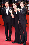 From left, actors Ahn Sung-ki, Eugene and Kim Hye-seong of the film 'Paper Flower' walk the red carpet at the opening of the 24th Busan International Film Festival (BIFF) on Oct. 3. [YONHAP]