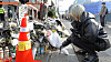 A citizen pays respects to the victims of the Itaewon tragedy at a makeshift memorial near Exit 1 of Itaewon Station on Wednesday. [NEWS1]