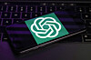 The logo for OpenAI, the maker of ChatGPT, appears on a mobile phone, in New York on Jan. 31, 2023. [AP/YONHAP]