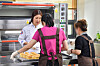 North Korean defectors learn how to make castella cakes from a South Korean pastry chef at Hanawon on Monday. [JOINT PRESS CORPS]