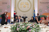 Carlos Victor Boungou, the Gabonese ambassador to Korea and dean of the diplomatic corps in Korea, left, makes a toast at Yeongbingwan State Guest House along with other foreign diplomats in Korea, including Dutch Ambassador to Korea Joanne Doornewaard, right, during a New Year celebration hosted by President Yoon Suk Yeol, center, and first lady Kim Keon-hee on Tuesday. [PRESIDENTIAL OFFICE]