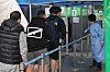 People wait in line to get tested for Covid-19 at a testing center in Yongsan DIstrict, central Seoul, on Tuesday. [YONHAP]