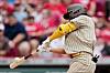 Kim Ha-seong of the San Diego Padres hits a home run in the eighth inning against the Cincinnati Reds at Great American Ball Park in Cincinnati, Ohio on Sunday. The long ball was Kim's fifth in the last 10 games and his 10th on the season, marking his second consecutive year with double-digit home runs. [AFP/YONHAP]