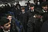 Students at The Merchant Taylors’ School, in the Northwood district of London, Jan. 18, 2023. More than 100 schools across England were ordered to close, on Thursday, Aug. 31, 2023, because they were built using unsafe concrete, the Department for Education said in a statement Thursday afternoon, a few days before the start of a new school year for most students. [Mary Turner/The New York Times]