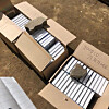 A post on an online community shows boxes of singer Kang Daniel's CDs thrown away on the street. The writing on the box reads, 'Take them.' [SCREEN CAPTURE]