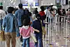 The domestic terminal of Gimpo International Airport in Seoul bustles with passengers on Wednesday ahead of Children's Day. [YONHAP]