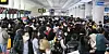 The departure terminal at Jeju International Airport is packed with people on Wednesday morning. [YONHAP]