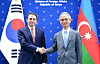 Elnur Mammadov, deputy foreign minister of Azerbaijan, left, shakes hands with Yeo Seung-bae, Korea's deputy foreign minister for political affairs, right, at the Foreign Ministry headquarters in Seoul on Thursday following their policy consultation meeting. The two discussed the 30th anniversary of Azerbaijan-Korea relations and cooperation on infrastructure and energy. [MINISTRY OF FOREIGN AFFAIRS]