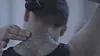A scene from the documentary ″Escape the Corset″ in which director Lee shaves off her own hair. [STUDIO PADONG]