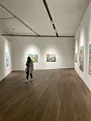 An international student looks at artworks at the 'Memory Beneath The Ego, Fantasy Above The Ego″ exhibition at the Seoul National University Museum of Art [DEEPTI NAIR]
