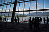 Delegates are silhouetted in a venue of a conference in Vancouver, British Columbia on July 11. [AP/YONHAP]