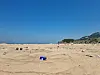 Garbage litters the sand on July 20 after the tide ebbed on Mokkimi Beach, Guleop Island. [SHIM SEOK-YONG]