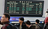 An electronic display board at Seoul Station in Jung District, central Seoul, indicates train delays on Jan. 28. [YONHAP]