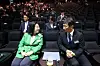 Lee Bok-hyun, right, head of the Financial Supervisory Service, speaks with Kim Eun-mee, president of Ewha Womans University, at a joint conference held at the school in Seoul on Tuesday. [YONHAP]