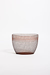 Dahye Jeong, a 33-year-old artisan who specializes in using horsehair to weave into baskets, is the winner of the 2022 Loewe Foundation Craft Prize for “A Time of Sincerity” (2021). [LOEWE FOUNDATION]