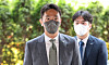 Financial Supervisory Service chairman Lee Bok-hyun enters the FSS office in Yeouido, western Seoul, on June 8. [YONHAP]