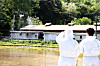 Workers from the Ministry of Agriculture, Food and Rural Affairs use drones to spray wild boar repellent near a pig farm on Thursday. The Agriculture Ministry announced plans on the same day to prevent the possible spread of African swine fever on pig farms by inspecting sites and using repellents. [YONHAP]