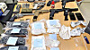 Seized items of a man indicted on Monday for smuggling drugs and guns from the United States to Korea, including seven guns and methamphetamines [SEOUL CENTRAL DISTRICT PROSECUTORS' OFFICE]