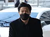 Lee Im-jae, former head of the Yongsan Police Precinct, appears for a hearing at the Seoul Western District Court on Friday. [YONHAP]