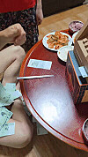 A handmade cardboard ATM spits out a seemingly endless stream of 10,000 won ($7) bills [SCREEN CAPTURE]