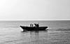 A vessel carrying North Korean returnees crosses into Northern waters in the East Sea on July 9. According to the Unification Ministry, the boat — carrying six North Korean men rescued south of the NLL in March and May — crossed the maritime border at 8:56 a.m. and met a North Korean patrol ship at 9:24 a.m. [MINISTRY OF UNIFICATION]