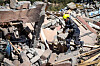 A rescue worker searches for survivors in the rubble of destroyed houses in Talat-n-Ya'qoub, Al-Haouz province, on Sept. 11, 2023. [AFP/YONHAP]