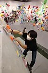 A customer tries a climbing wall at Peakers in the CGV Piccadilly 1958 in Jongno, Seoul, on Thursday. The multiplex, one of the oldest cinemas in Korea, turned one of its theaters into an indoor playground for adults. Movie theaters have been struggling over the last two years. In the first half of 2021 moviegoers dropped 38.2 percent year-on-year to 22 million. [YONHAP]