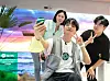 Rapper Simon Dominic takes a picture with customers ordering the Galaxy Z Fold 3 and Galaxy Z Flip 3 on Monday evening at a party held at LG U+'s culture space Daily Teum in southern Seoul. [LG U+]