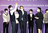 BTS's leader RM celebrating after being officially appointed as the representative of the World Expo 2030 Busan at the Hybe office in Seoul on Tuesday. [YONHAP]