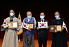 Ven. Seollae, far left, Wesley John Wentworth Jr., second from left, and Sister Cristina Evelina Gal, far right, are awarded Korean citizenship by Justice Minister Park Beom-gye in a ceremony Thursday. [YONHAP]