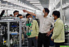 Lee Jae-yong, second from right, tours a Samsung Electronics smartphone manufacturing plant in Hanoi, Vietnam, during his visit last week. [SAMSUNG ELECTRONICS]