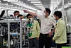 Lee Jae-yong, second from right, tours a Samsung Electronics smartphone manufacturing plant in Hanoi, Vietnam, during his visit last week. [SAMSUNG ELECTRONICS]