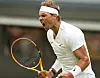 Rafael Nadal of Spain celebrates scoring against Francisco Cerundolo of Argentina during the men's singles first round match at Wimbledon on Centre Court at the All England Lawn Tennis and Croquet Club in London on Tuesday. [XINHUA/YONHAP]
