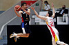 Korea's Heo Hoon, left, duels with Hu Minguan of China during the FIBA Basketball Asia Cup 2022 group stage match at Istora Bung Karno Stadium in Jakarta, Indonesia on July 12.  [EPA/YONHAP]