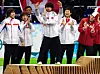 Kwak Yoon-gy, center, dances on the podium at the 2010 Vancouver Games after winning the men's 5,000-meter relay silver medal. [SBS/JOONGANG ILBO]