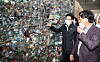 Environment Minister Cho Myung-rae inspects a PET recycling company in Hwaseong, Gyeonggi, on Thursday. The Ministry of Environment is buying up 10,000 tons of PET materials together with the Korea Environment Corporation starting July 7. Amid the coronavirus, PET has accumulated due to the weak economy, falling oil prices and a sharp drop in exports. [YONHAP]