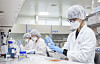 SK Bioscience researchers conduct tests at the company's lab. [SK BIOSCIENCE]